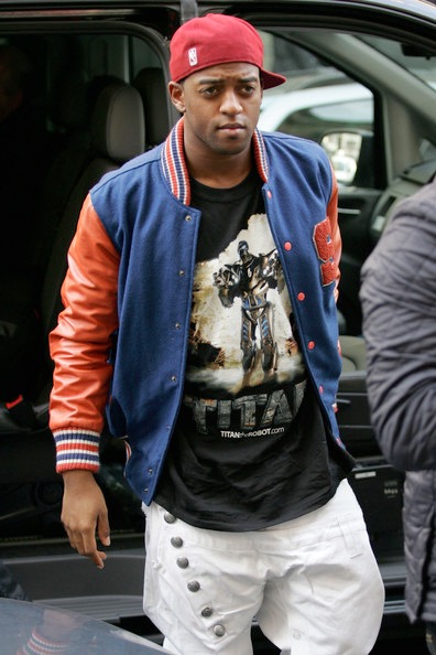 Oritsé Williams from JLS wears a Titan the Robot t-shirt when photographed by the press.
