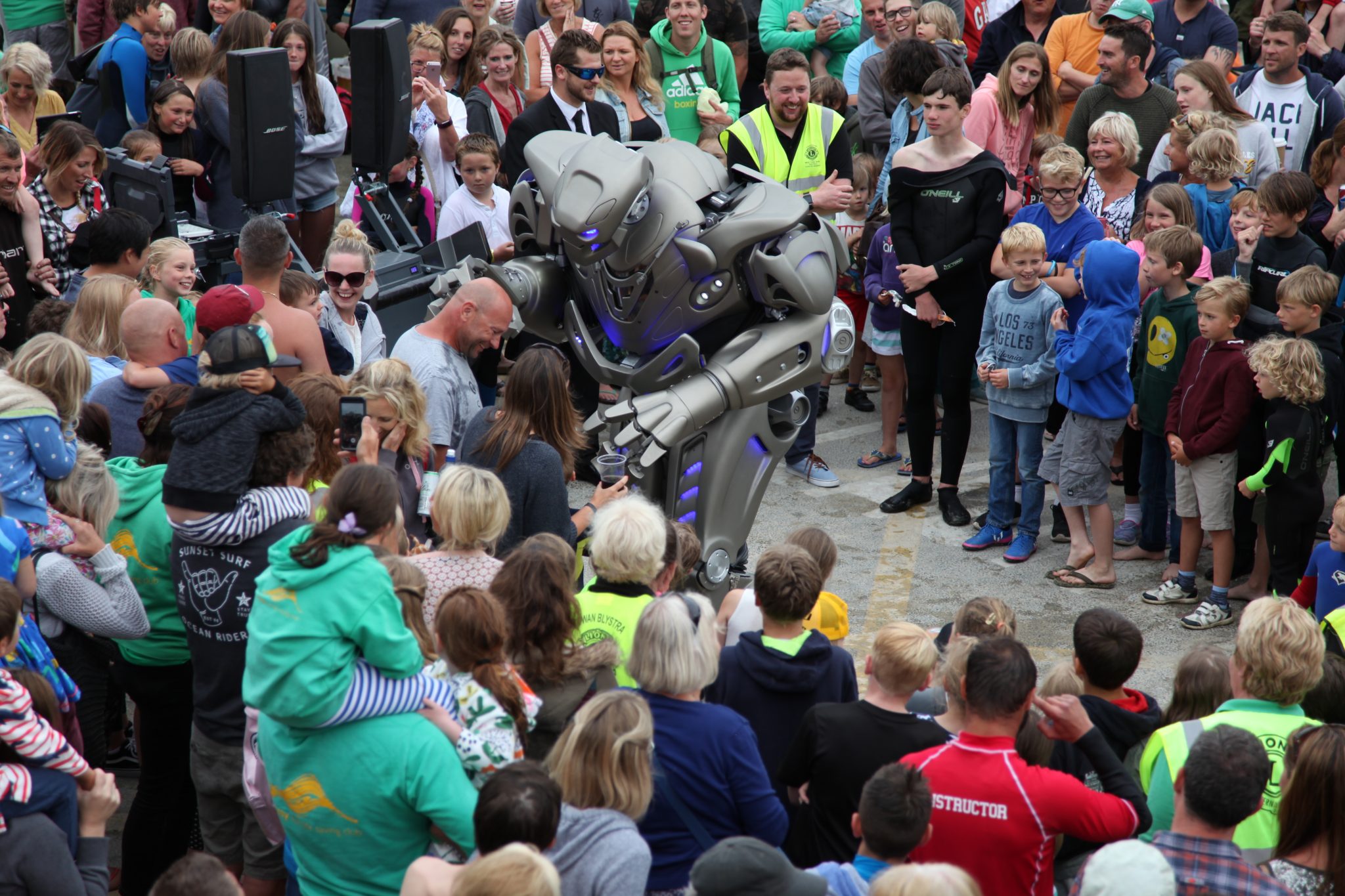 Titan the Robot scratches someones head in Newquay, Cornwall. 