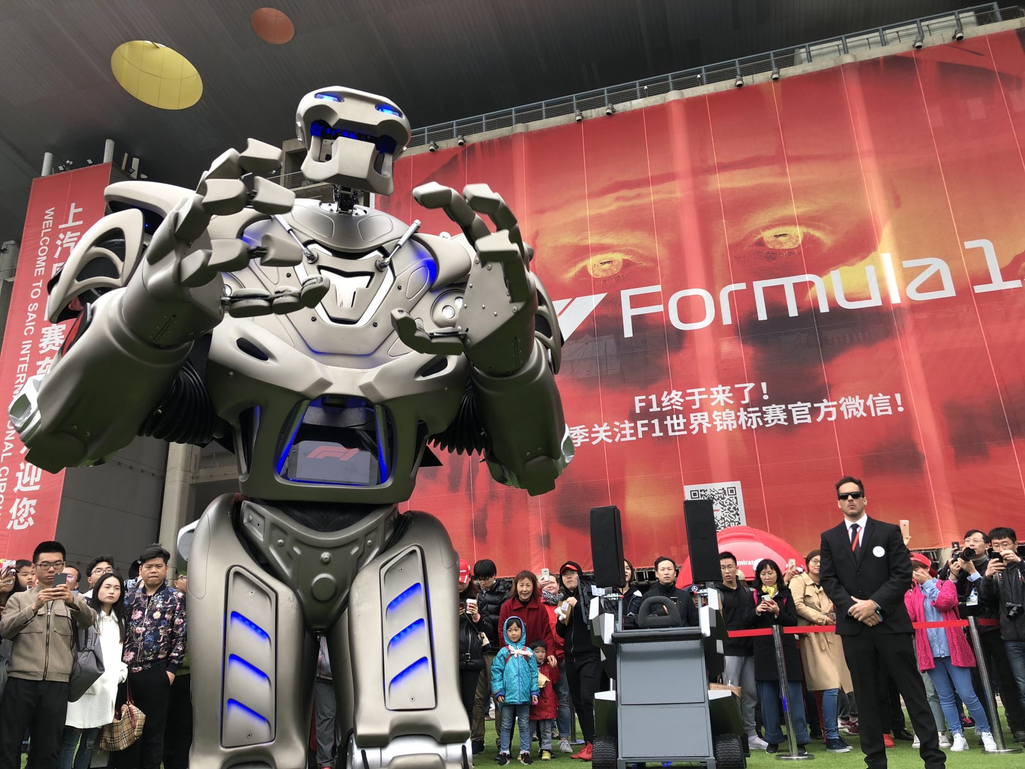 Titan the Robot performing at the Shanghai F1 Grand Prix in China under Dave's watchful eye.
