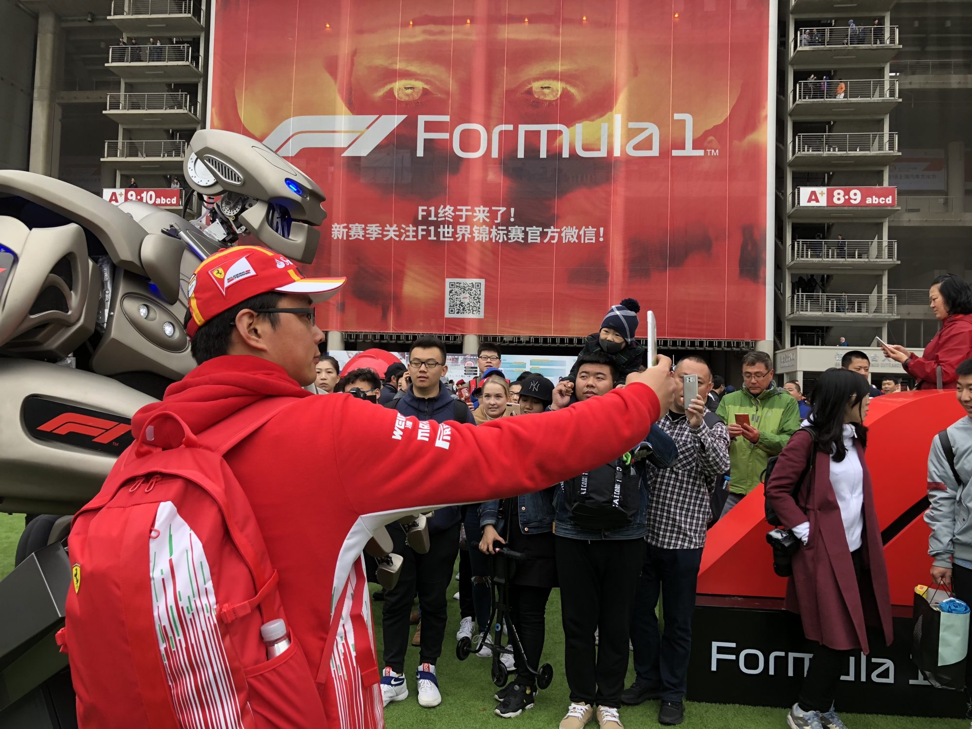 Titan the Robot posing for selfies at the Shanghai F1 Grand Prix in China.