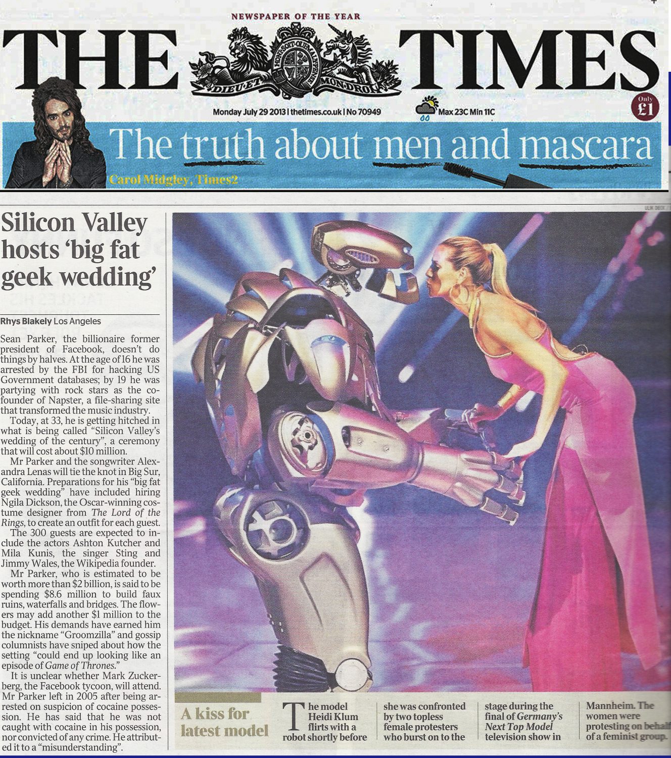 Titan the Robot kissing Heidi Klum in The Times newspaper. 