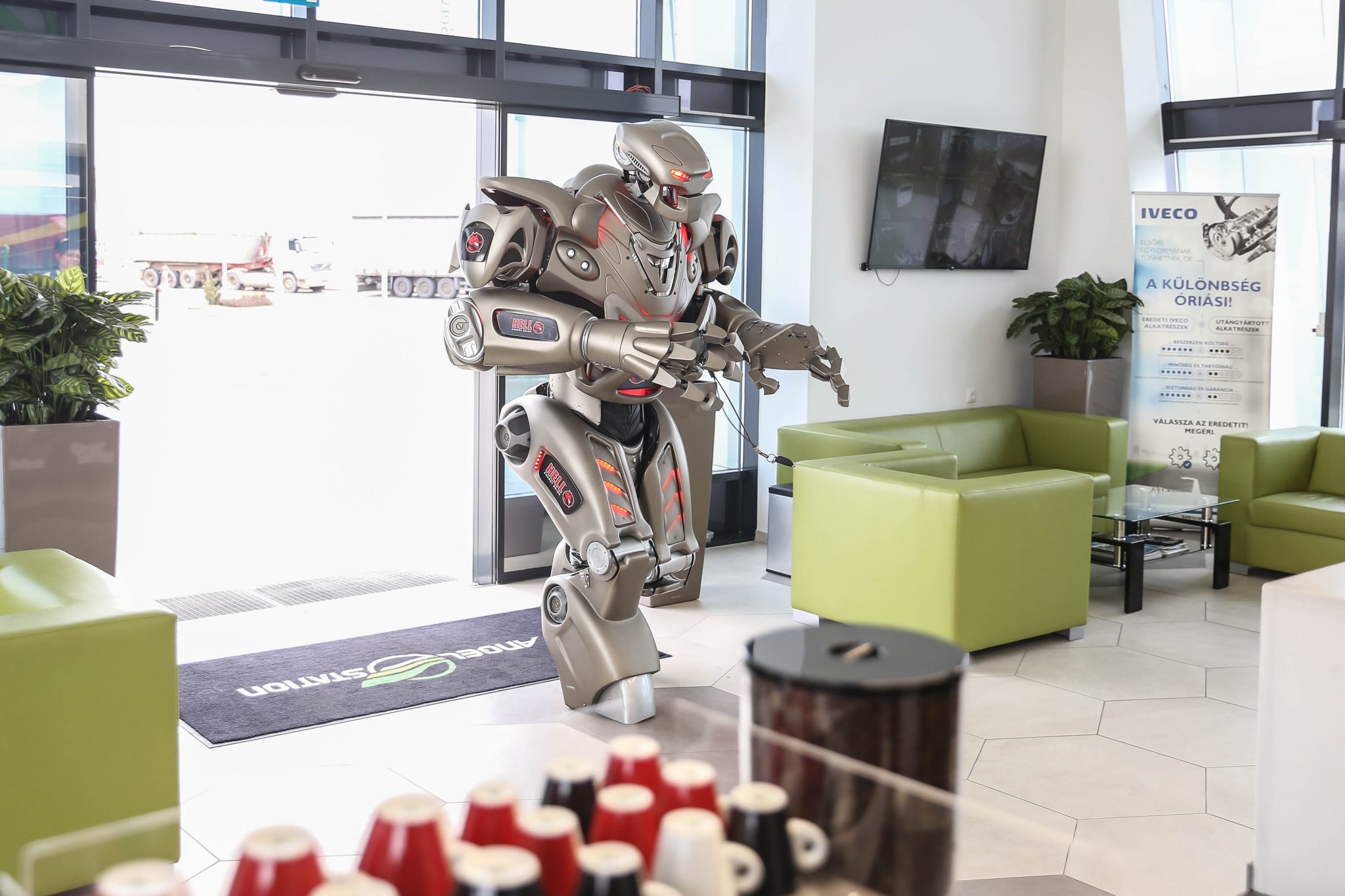Titan the Robot stops for refreshments at a service station in Hungary.