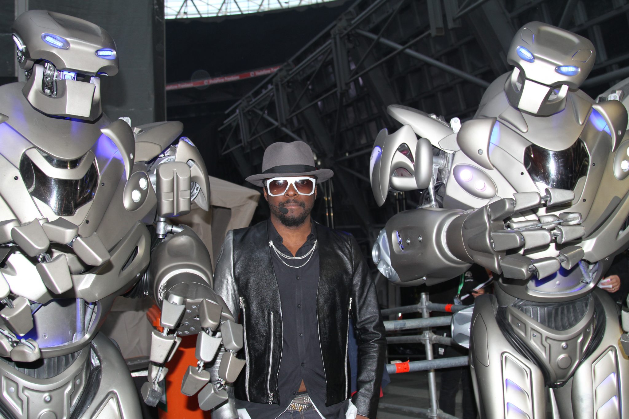 Will.i.am and Titan the Robot back stage at Wembley Stadium Capital FM Summertime Ball.
