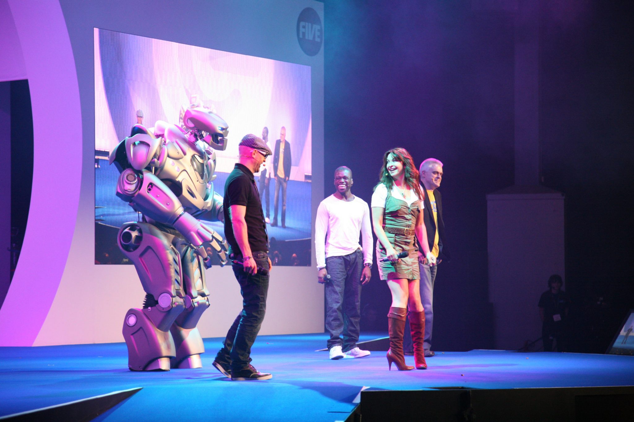 Titan the Robot on stage at the Gadget Show Live with Suzi Perry, Otis Deley, Jason Bradbury and John Bentley. 