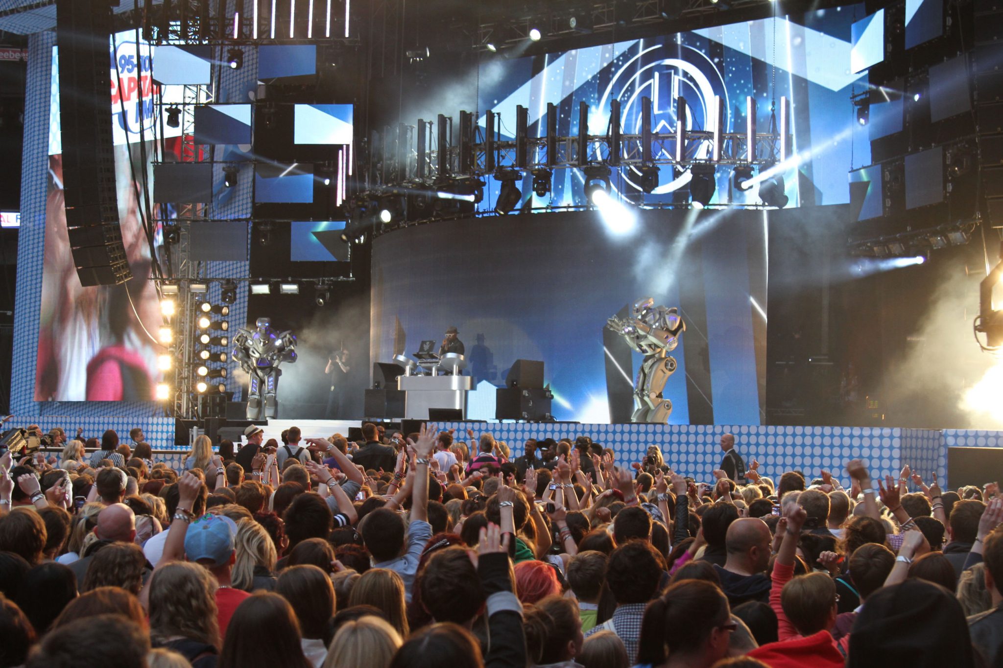 Titan the Robot on stage with Will.i.am at Wembley Stadium at the Capital FM summertime ball.